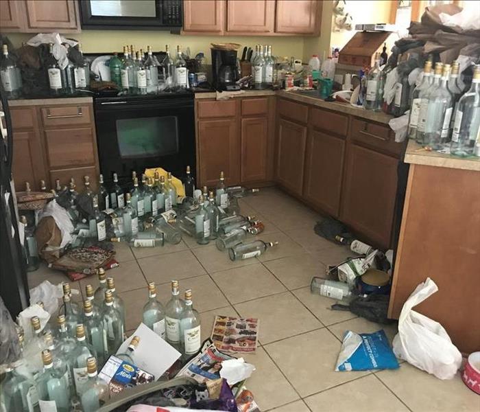 Kitchen with trash and debris everywhere